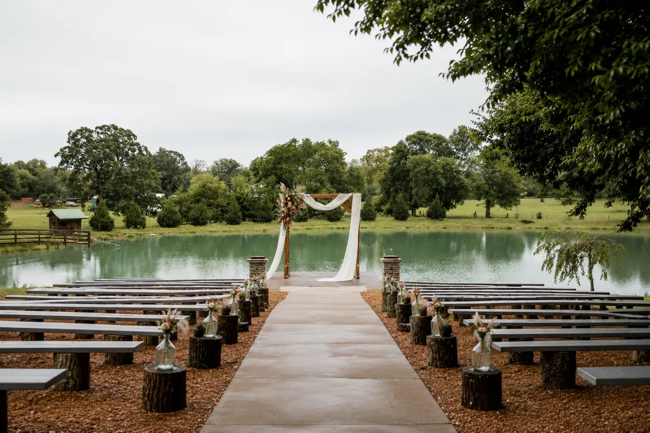Steel Magnolia Barn lakeside ceremony