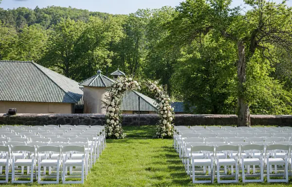 The Barn at the Crane Estate garden ceremony
