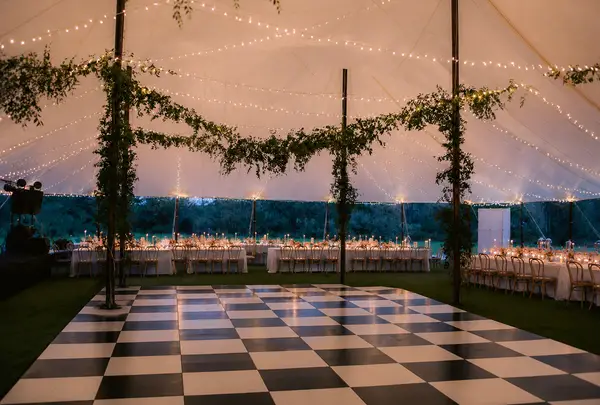 Kenoza Hall tented reception with black white checkered dancefloor