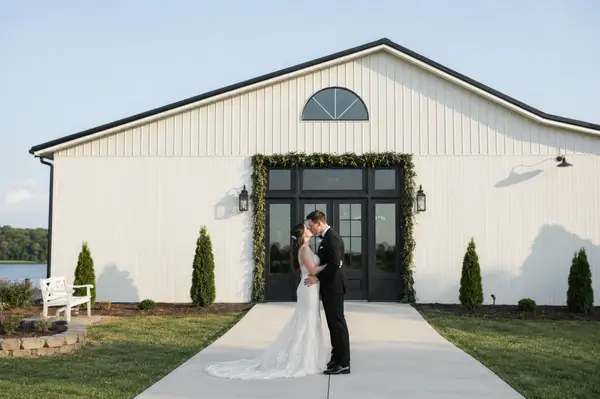Barn in the Bend groom bride kiss