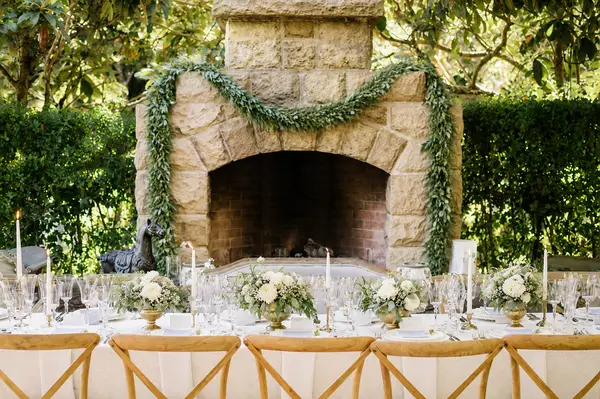 San Ysidro Ranch courtyard reception with fireplace